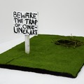 Beth Fox 'One-Liner Art'  2012, wooden sign, turf, branches, charcoal dimensions variable